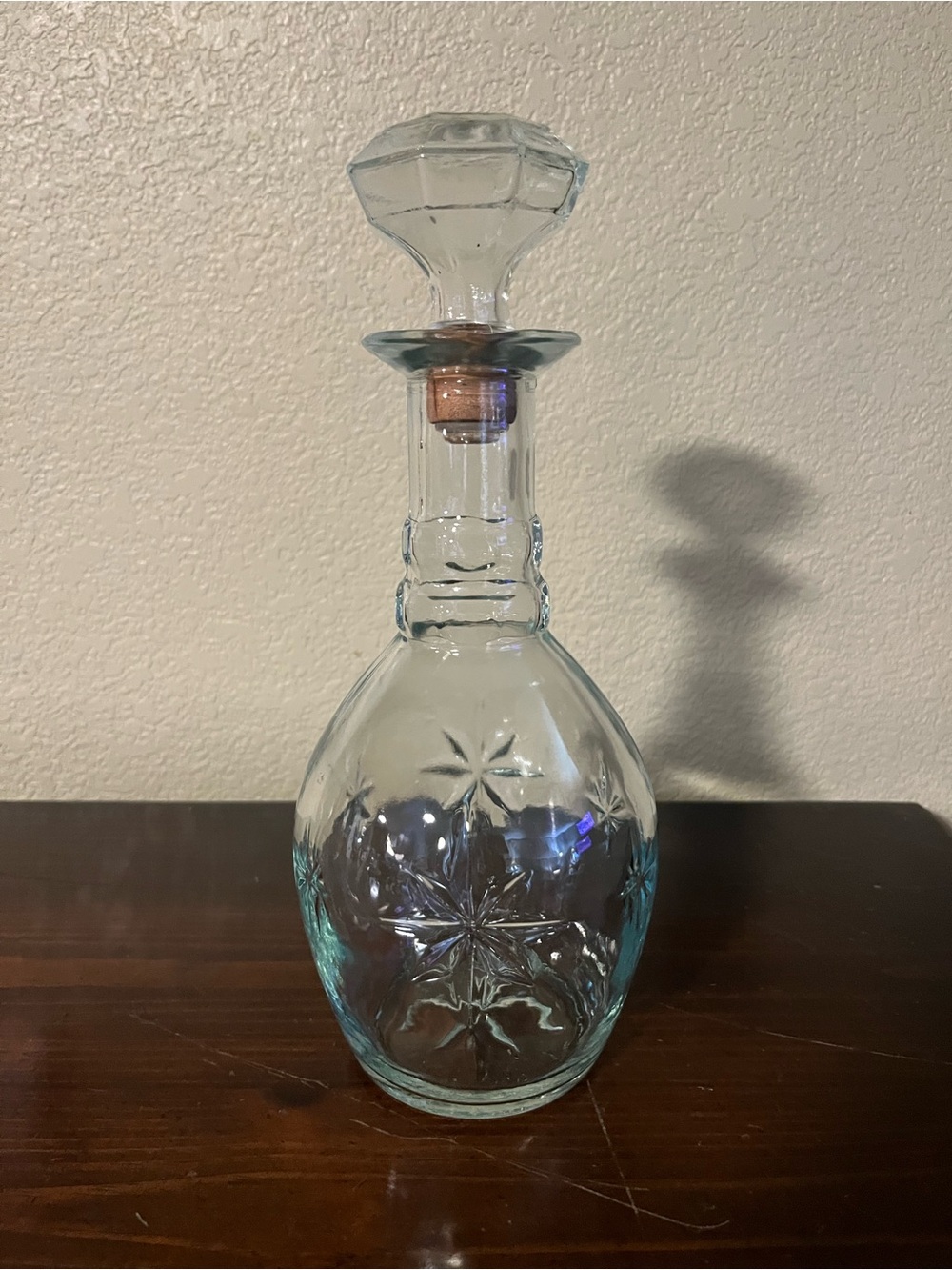 Vintage Clear Glass Decanter with a distinct starburst pattern and matching top